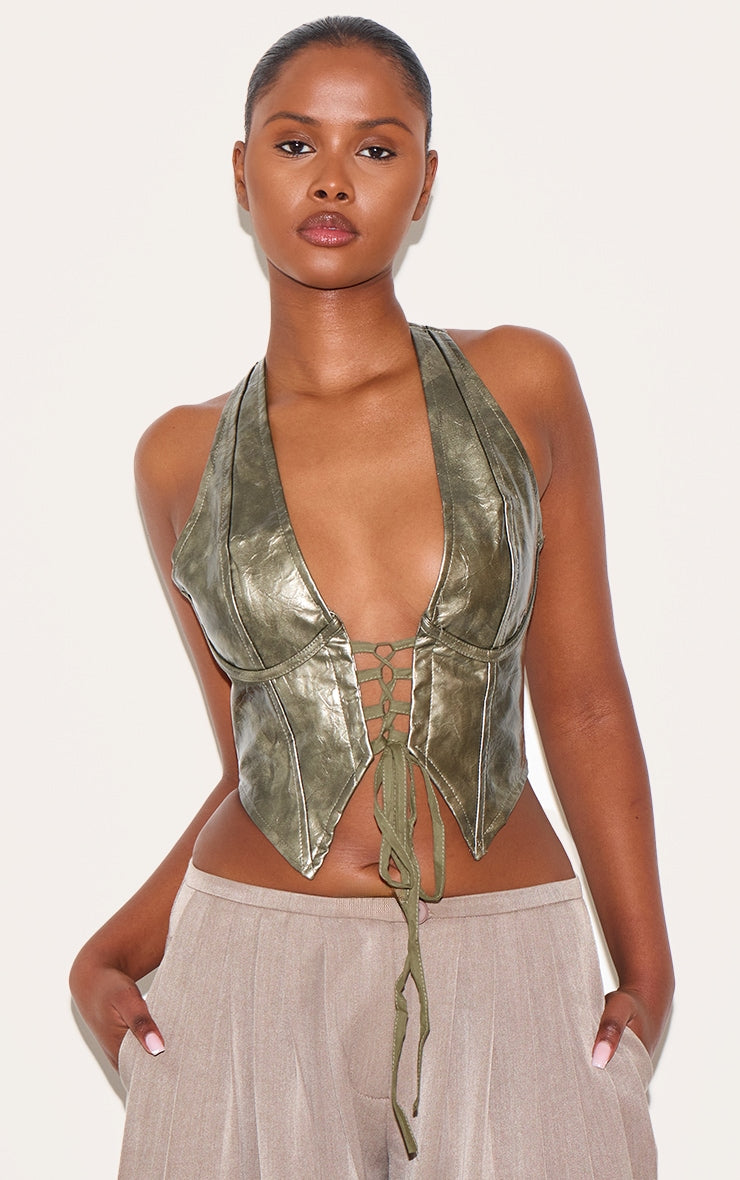 https://cdn-img.prettylittlething.com/8/7/9/d/879d8678765f544849756a5c3be6a5c7ba4ef406_CNB1617_1_dark_green_washed_faux_leather_lace_up_plunge_halterneck_top.jpg